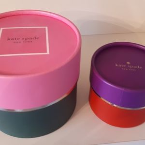 KATE SPADE gift boxes in bright colors.